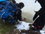 Cristian examing the hole in the ice that he just fell through! Photo